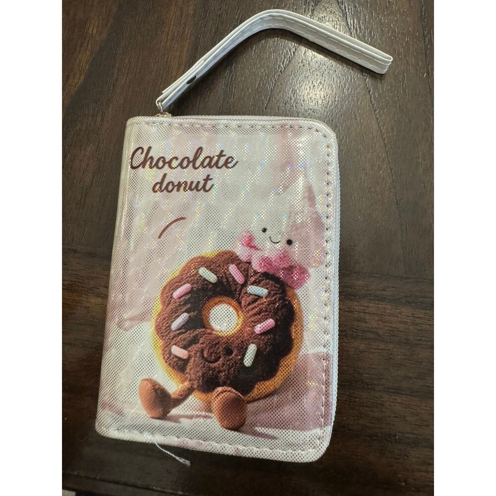 Kawaii chocolate donut with sprinkles and a smiling face wallet strap